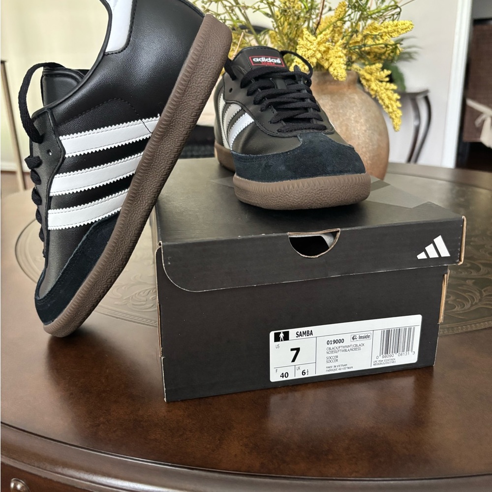 Adidas Black and White Sneakers with Iconic Stripes